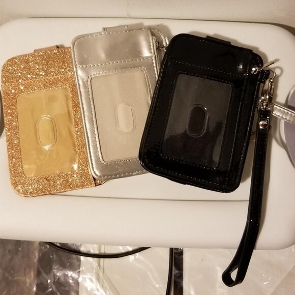 Gold, Silver, and Black Cell Wallets - Picture 1 of 2